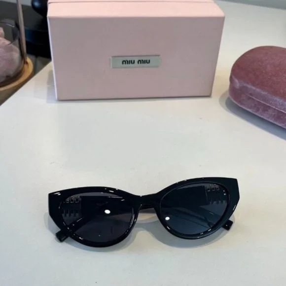 Miu Miu Black Cat-Eye Sunglasses with Gold Temple Detail - Picture 2 of 5